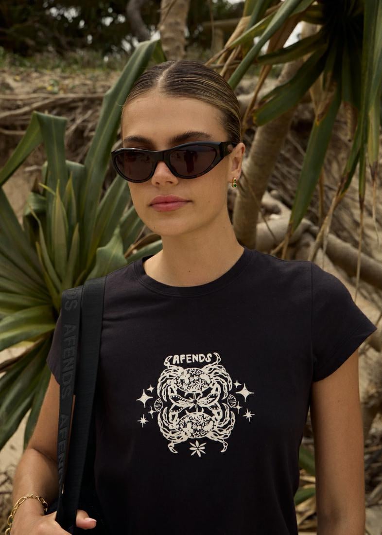 Afends Tropic Of Cancer Baby Tee Black. Afends Tees in Womens Tees & Womens T-shirts & Singlets. Code: W254001